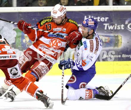 EBEL. Eishockey Bundesliga. KAC gegen VSV. Johannes Kirisits, (KAC),  Tomaz Razingar (VSV). Klagenfurt, am 4.2.2011.
Foto: Kuess 

---
pressefotos, pressefotografie, kuess, qs, qspictures, sport, bild, bilder, bilddatenbank