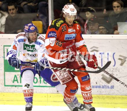 EBEL. Eishockey Bundesliga. KAC gegen VSV. Christoph Brandner, (KAC),  Tomaz Razingar (VSV). Klagenfurt, am 4.2.2011.
Foto: Kuess 

---
pressefotos, pressefotografie, kuess, qs, qspictures, sport, bild, bilder, bilddatenbank