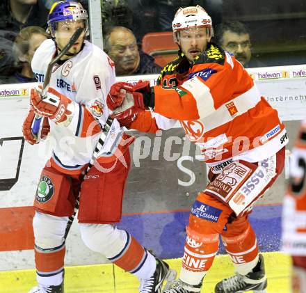 EBEL. Eishockey Bundesliga. KAC gegen EC Red Bull Salzburg. Johannes Kirisits, (KAC), Thomas Koch (Salzburg). Klagenfurt, am 6.2.2011.
Foto: Kuess 

---
pressefotos, pressefotografie, kuess, qs, qspictures, sport, bild, bilder, bilddatenbank