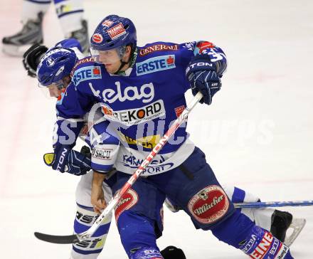 EBEL. Eishockey Bundesliga. EC Rekordfenster VSV gegen KHL Medvescak Zagreb.  Benjamin Petrik (VSV),  Miroslav Brumercik (Zagreb). Villach, am 8.2.2011.
Foto: Kuess

---
pressefotos, pressefotografie, kuess, qs, qspictures, sport, bild, bilder, bilddatenbank