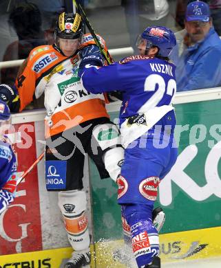 EBEL. Eishockey Bundesliga. EC  VSV gegen Graz 99ers . Greg Kuznik,  (VSV), Quinn Hancock (Graz). Villach, am 11.2.2011.
Foto: Kuess 


---
pressefotos, pressefotografie, kuess, qs, qspictures, sport, bild, bilder, bilddatenbank