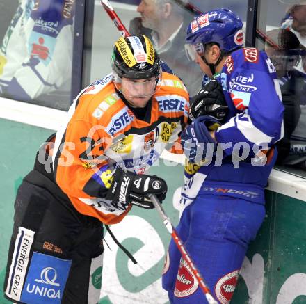 EBEL. Eishockey Bundesliga. EC  VSV gegen Graz 99ers . Joshua Langfeld,  (VSV), Florian Iberer (Graz). Villach, am 11.2.2011.
Foto: Kuess 


---
pressefotos, pressefotografie, kuess, qs, qspictures, sport, bild, bilder, bilddatenbank