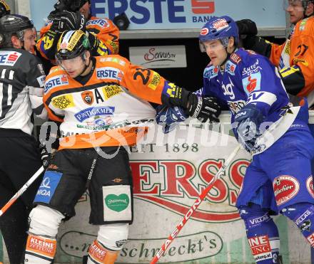 EBEL. Eishockey Bundesliga. EC  VSV gegen Graz 99ers . Jonathan Ferland,  (VSV), Florian Iberer (Graz). Villach, am 11.2.2011.
Foto: Kuess 


---
pressefotos, pressefotografie, kuess, qs, qspictures, sport, bild, bilder, bilddatenbank