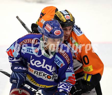 EBEL. Eishockey Bundesliga. EC  VSV gegen Graz 99ers . Derek Damon, (VSV), Warren Norris (Graz). Villach, am 11.2.2011.
Foto: Kuess 


---
pressefotos, pressefotografie, kuess, qs, qspictures, sport, bild, bilder, bilddatenbank