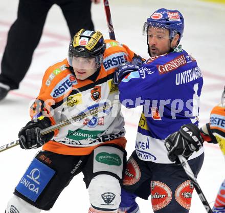 EBEL. Eishockey Bundesliga. EC  VSV gegen Graz 99ers . Gerhard Unterluggauer,  (VSV), Michael Ouellette (Graz). Villach, am 11.2.2011.
Foto: Kuess 


---
pressefotos, pressefotografie, kuess, qs, qspictures, sport, bild, bilder, bilddatenbank