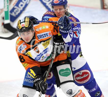 EBEL. Eishockey Bundesliga. EC  VSV gegen Graz 99ers . Roland Kaspitz,  (VSV), Michael Ouellette (Graz). Villach, am 11.2.2011.
Foto: Kuess 


---
pressefotos, pressefotografie, kuess, qs, qspictures, sport, bild, bilder, bilddatenbank