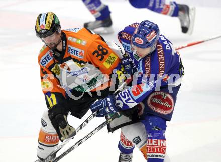 EBEL. Eishockey Bundesliga. EC  VSV gegen Graz 99ers . Derek Damon,  (VSV), Yannik Tremblay (Graz). Villach, am 11.2.2011.
Foto: Kuess 


---
pressefotos, pressefotografie, kuess, qs, qspictures, sport, bild, bilder, bilddatenbank