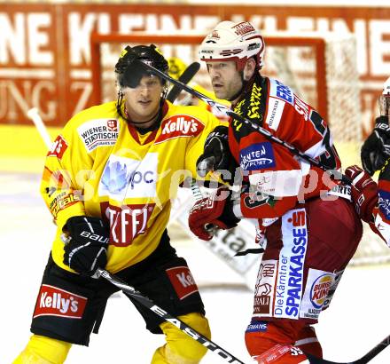 EBEL. Eishockey Bundesliga. KAC gegen EV Vienna Capitals. Jeff Shantz, (KAC), Corry Larose (Vienna). Klagenfurt, am 13.2.2011.
Foto: Kuess 

---
pressefotos, pressefotografie, kuess, qs, qspictures, sport, bild, bilder, bilddatenbank