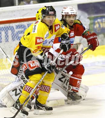 EBEL. Eishockey Bundesliga. KAC gegen EV Vienna Capitals. Dieter Kalt, (KAC), Jeremy Rebek (Vienna). Klagenfurt, am 13.2.2011.
Foto: Kuess 

---
pressefotos, pressefotografie, kuess, qs, qspictures, sport, bild, bilder, bilddatenbank