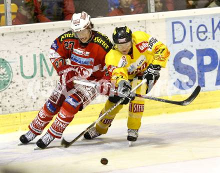 EBEL. Eishockey Bundesliga. KAC gegen EV Vienna Capitals. Thomas HUndertpfund, (KAC), Jeremy Rebek (Vienna). Klagenfurt, am 13.2.2011.
Foto: Kuess 

---
pressefotos, pressefotografie, kuess, qs, qspictures, sport, bild, bilder, bilddatenbank