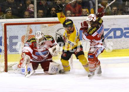 EBEL. Eishockey Bundesliga. KAC gegen EV Vienna Capitals. Andy Chiodo, Martin Schumnig, (KAC), Benoit Gratton (Vienna). Klagenfurt, am 13.2.2011.
Foto: Kuess 

---
pressefotos, pressefotografie, kuess, qs, qspictures, sport, bild, bilder, bilddatenbank