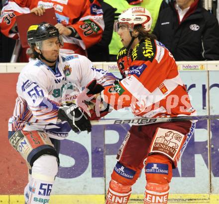 EBEL. Eishockey Bundesliga. KAC gegen SAPA Fehervar AV19. Thomas Hundertpfund (KAC), Roger Holeczy (Alba Volan). Klagenfurt, am 15.2.2011.
Foto: Kuess
---
pressefotos, pressefotografie, kuess, qs, qspictures, sport, bild, bilder, bilddatenbank