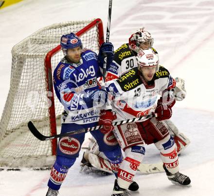 EBEL. Eishockey Bundesliga. EC  VSV gegen KAC.  Derek Damon, (VSV), Johannes Kirisits, Rene Swette (KAC). Villach, am 18.2.2011.
Foto: Kuess 


---
pressefotos, pressefotografie, kuess, qs, qspictures, sport, bild, bilder, bilddatenbank