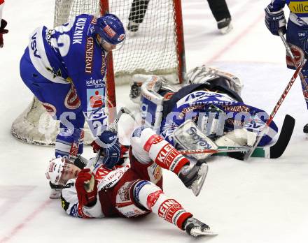 EBEL. Eishockey Bundesliga. EC  VSV gegen KAC.  Greg Kuznik, Bernhard Starkbaum, (VSV), Markus Pirmann (KAC). Villach, am 18.2.2011.
Foto: Kuess 


---
pressefotos, pressefotografie, kuess, qs, qspictures, sport, bild, bilder, bilddatenbank