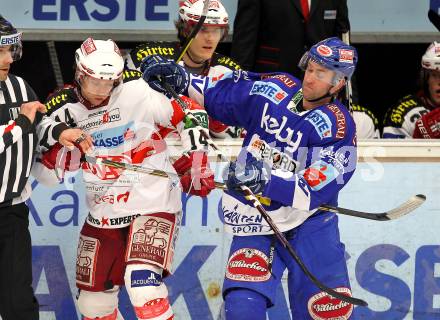 EBEL. Eishockey Bundesliga. EC  VSV gegen KAC.  Tomaz Razingar, (VSV), Johannes Reichel (KAC). Villach, am 18.2.2011.
Foto: Kuess 


---
pressefotos, pressefotografie, kuess, qs, qspictures, sport, bild, bilder, bilddatenbank