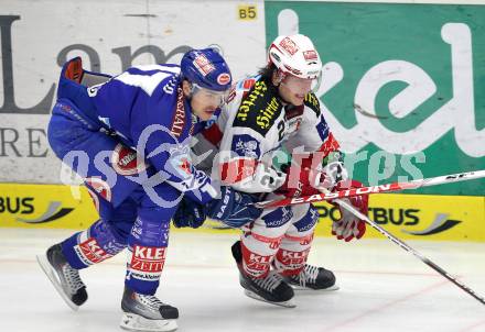 EBEL. Eishockey Bundesliga. EC  VSV gegen KAC. Joshua Langfeld, (VSV), Thomas Hundertpfund  (KAC). Villach, am 18.2.2011.
Foto: Kuess 


---
pressefotos, pressefotografie, kuess, qs, qspictures, sport, bild, bilder, bilddatenbank