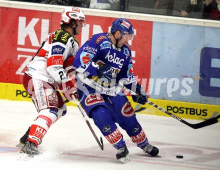 EBEL. Eishockey Bundesliga. EC  VSV gegen KAC. Tomaz Razingar,  (VSV), Thomas Hundertpfund  (KAC). Villach, am 18.2.2011.
Foto: Kuess 


---
pressefotos, pressefotografie, kuess, qs, qspictures, sport, bild, bilder, bilddatenbank