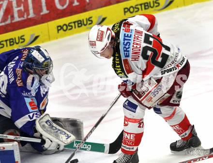 EBEL. Eishockey Bundesliga. EC  VSV gegen KAC. Bernhard Starkbaum,  (VSV), Thomas Hundertpfund (KAC). Villach, am 18.2.2011.
Foto: Kuess 


---
pressefotos, pressefotografie, kuess, qs, qspictures, sport, bild, bilder, bilddatenbank