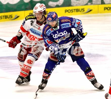 EBEL. Eishockey Bundesliga. EC  VSV gegen KAC.  Christof Martinz, (VSV), Manuel Geier (KAC). Villach, am 18.2.2011.
Foto: Kuess 


---
pressefotos, pressefotografie, kuess, qs, qspictures, sport, bild, bilder, bilddatenbank