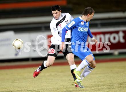 Fussball Erste Liga. WAC/St. Andrae gegen SV Groedig. Roland Putsche,  (WAC), Mersudin Jukic (Groedig). Wolfsberg, 25.2.2011
Foto: Kuess

---
pressefotos, pressefotografie, kuess, qs, qspictures, sport, bild, bilder, bilddatenbank