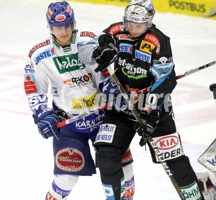 EBEL. Eishockey Bundesliga. EC  VSV gegen EHC LIWEST Linz. Stefan Bacher (VSV), CASHMAN Reid (Linz). Villach, am 27.2.2011.
Foto: Kuess 


---
pressefotos, pressefotografie, kuess, qs, qspictures, sport, bild, bilder, bilddatenbank