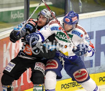 EBEL. Eishockey Bundesliga. EC  VSV gegen EHC LIWEST Linz. Benjamin Petrik (VSV), SCHOLZ Fabian (Linz). Villach, am 27.2.2011.
Foto: Kuess 


---
pressefotos, pressefotografie, kuess, qs, qspictures, sport, bild, bilder, bilddatenbank