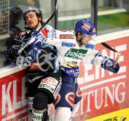 EBEL. Eishockey Bundesliga. EC  VSV gegen EHC LIWEST Linz. Benjamin Petrik (VSV), SCHOLZ Fabian (Linz). Villach, am 27.2.2011.
Foto: Kuess 


---
pressefotos, pressefotografie, kuess, qs, qspictures, sport, bild, bilder, bilddatenbank