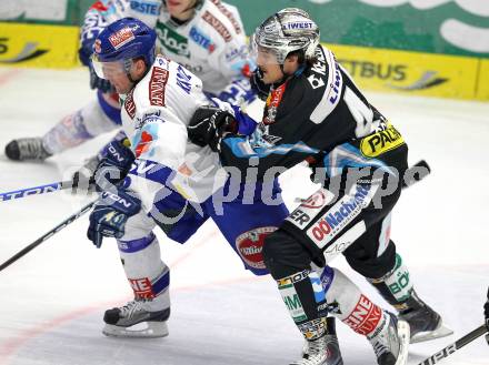 EBEL. Eishockey Bundesliga. EC  VSV gegen EHC LIWEST Linz. Roland Kaspitz (VSV), SCHOLZ Fabian (Linz). Villach, am 27.2.2011.
Foto: Kuess 


---
pressefotos, pressefotografie, kuess, qs, qspictures, sport, bild, bilder, bilddatenbank