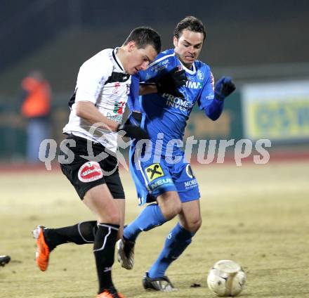 Fussball. Erste Liga. WAC/St. Andrae gegen FC Lustenau. Sandro Gotal, (WAC), Ibrahim Erbek (Lustenau). Wolfsberg, 4.3.2011.
Foto: Kuess

---
pressefotos, pressefotografie, kuess, qs, qspictures, sport, bild, bilder, bilddatenbank