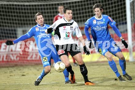 Fussball. Erste Liga. WAC/St. Andrae gegen FC Lustenau. Sandro Gotal, (WAC), Philipp Hagspiel, Christoph Schoesswendter (Lustenau). Wolfsberg, 4.3.2011.
Foto: Kuess

---
pressefotos, pressefotografie, kuess, qs, qspictures, sport, bild, bilder, bilddatenbank