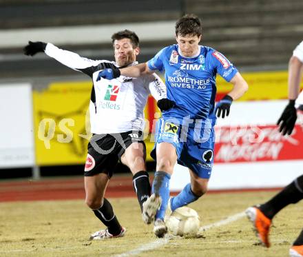 Fussball. Erste Liga. WAC/St. Andrae gegen FC Lustenau. Markus Kreuz, (WAC), Daniel Schoepf (Lustenau). Wolfsberg, 4.3.2011.
Foto: Kuess

---
pressefotos, pressefotografie, kuess, qs, qspictures, sport, bild, bilder, bilddatenbank