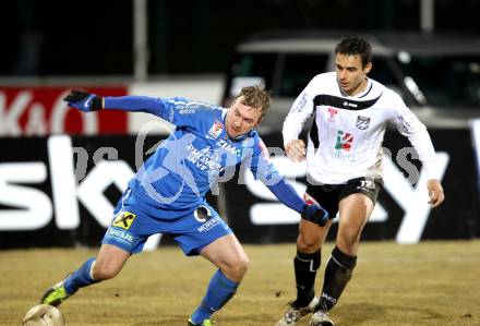 Fussball. Erste Liga. WAC/St. Andrae gegen FC Lustenau. Nenad Jovanovic, (WAC), Patrick Seeger (Lustenau). Wolfsberg, 4.3.2011.
Foto: Kuess

---
pressefotos, pressefotografie, kuess, qs, qspictures, sport, bild, bilder, bilddatenbank