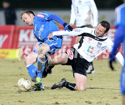 Fussball. Erste Liga. WAC/St. Andrae gegen FC Lustenau. Hannes Jochum, (WAC), Patrick Seeger (Lustenau). Wolfsberg, 4.3.2011.
Foto: Kuess

---
pressefotos, pressefotografie, kuess, qs, qspictures, sport, bild, bilder, bilddatenbank