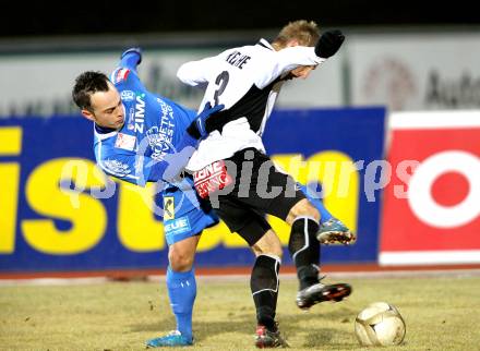 Fussball. Erste Liga. WAC/St. Andrae gegen FC Lustenau. Manuel Kerhe, (WAC), Harun Erbek (Lustenau). Wolfsberg, 4.3.2011.
Foto: Kuess

---
pressefotos, pressefotografie, kuess, qs, qspictures, sport, bild, bilder, bilddatenbank