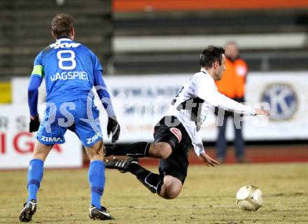 Fussball. Erste Liga. WAC/St. Andrae gegen FC Lustenau. Marco Reich, (WAC), Philipp Hagspiel (Lustenau). Wolfsberg, 4.3.2011.
Foto: Kuess

---
pressefotos, pressefotografie, kuess, qs, qspictures, sport, bild, bilder, bilddatenbank