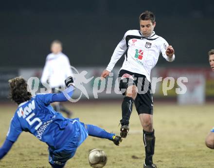 Fussball. Erste Liga. WAC/St. Andrae gegen FC Lustenau. Marco Reich, (WAC), Christoph Schoesswendter (Lustenau). Wolfsberg, 4.3.2011.
Foto: Kuess

---
pressefotos, pressefotografie, kuess, qs, qspictures, sport, bild, bilder, bilddatenbank