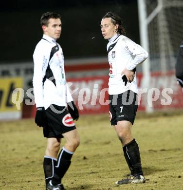 Fussball. Erste Liga. WAC/St. Andrae gegen FC Lustenau. Marco Sahanek, (WAC), Dario Baldauf (Lustenau). Wolfsberg, 4.3.2011.
Foto: Kuess

---
pressefotos, pressefotografie, kuess, qs, qspictures, sport, bild, bilder, bilddatenbank