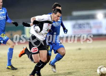 Fussball. Erste Liga. WAC/St. Andrae gegen FC Lustenau. Sandro Gotal, (WAC), Ibrahim Erbek (Lustenau). Wolfsberg, 4.3.2011.
Foto: Kuess

---
pressefotos, pressefotografie, kuess, qs, qspictures, sport, bild, bilder, bilddatenbank