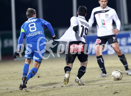 Fussball. Erste Liga. WAC/St. Andrae gegen FC Lustenau. Roland Putsche, (WAC), Philipp Hagspiel (Lustenau). Wolfsberg, 4.3.2011.
Foto: Kuess

---
pressefotos, pressefotografie, kuess, qs, qspictures, sport, bild, bilder, bilddatenbank