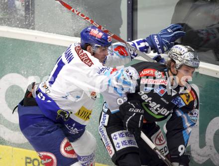 EBEL. Eishockey Bundesliga. EC  VSV gegen EHC LIWEST Linz. Mario Altmann,  (VSV), Martin Grabher Meier (Linz). Villach, am 8.3.2011.
Foto: Kuess 


---
pressefotos, pressefotografie, kuess, qs, qspictures, sport, bild, bilder, bilddatenbank