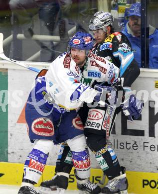 EBEL. Eishockey Bundesliga. EC  VSV gegen EHC LIWEST Linz.  Kevin Mitchell, (VSV), Philipp Lukas (Linz). Villach, am 8.3.2011.
Foto: Kuess 


---
pressefotos, pressefotografie, kuess, qs, qspictures, sport, bild, bilder, bilddatenbank