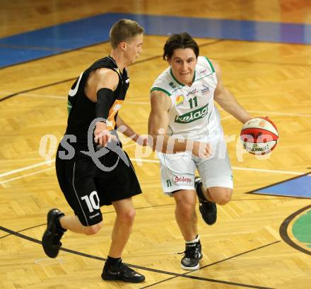 ABL. Basketbal Bundesliga. Kelag Woerthersee Piraten gegen UBC Guessing Knights. Andreas Kuttnig (Piraten), Thomas Klepeisz (Guessing). Klagenfurt, am 12.3.2011.
Foto: Kuess
---
pressefotos, pressefotografie, kuess, qs, qspictures, sport, bild, bilder, bilddatenbank