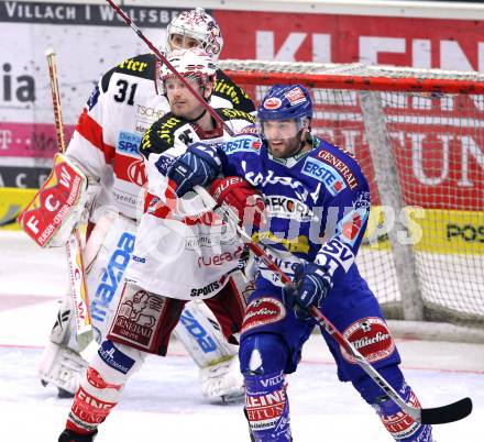 EBEL. Eishockey Bundesliga. EC  VSV gegen KAC.  Nikolas Petrik, (VSV), Kirk Furey (KAC). Villach, am 17.3.2011.
Foto: Kuess 


---
pressefotos, pressefotografie, kuess, qs, qspictures, sport, bild, bilder, bilddatenbank