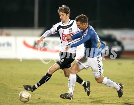 Fussball Erste Liga. WAC/St. Andrae gegen SKN St. Poelten. Christian Falk,  (WAC), Manuel Roedl (St.Poelten). Wolfsberg, 18.3.2011
Foto: Kuess

---
pressefotos, pressefotografie, kuess, qs, qspictures, sport, bild, bilder, bilddatenbank