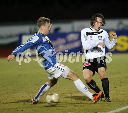 Fussball Erste Liga. WAC/St. Andrae gegen SKN St. Poelten. Dario Baldauf,  (WAC), Dominik Hofbauer (St.Poelten). Wolfsberg, 18.3.2011
Foto: Kuess

---
pressefotos, pressefotografie, kuess, qs, qspictures, sport, bild, bilder, bilddatenbank