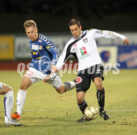 Fussball Erste Liga. WAC/St. Andrae gegen SKN St. Poelten.  Marco Reich, (WAC), Dominik Hofbauer (St.Poelten). Wolfsberg, 18.3.2011
Foto: Kuess

---
pressefotos, pressefotografie, kuess, qs, qspictures, sport, bild, bilder, bilddatenbank