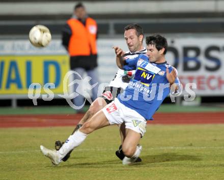 Fussball Erste Liga. WAC/St. Andrae gegen SKN St. Poelten. Hannes Jochum,  (WAC), Mirnes Becirovic (St.Poelten). Wolfsberg, 18.3.2011
Foto: Kuess

---
pressefotos, pressefotografie, kuess, qs, qspictures, sport, bild, bilder, bilddatenbank