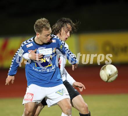 Fussball Erste Liga. WAC/St. Andrae gegen SKN St. Poelten. Dario Baldauf,  (WAC), Dominik Hofbauer (St.Poelten). Wolfsberg, 18.3.2011
Foto: Kuess

---
pressefotos, pressefotografie, kuess, qs, qspictures, sport, bild, bilder, bilddatenbank