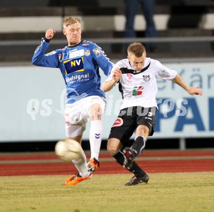 Fussball Erste Liga. WAC/St. Andrae gegen SKN St. Poelten. Manuel Kerhe,  (WAC), Thomas Froeschl (St.Poelten). Wolfsberg, 18.3.2011
Foto: Kuess

---
pressefotos, pressefotografie, kuess, qs, qspictures, sport, bild, bilder, bilddatenbank