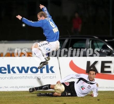 Fussball Erste Liga. WAC/St. Andrae gegen SKN St. Poelten. Marco Reich, (WAC), Michael Popp  (St.Poelten). Wolfsberg, 18.3.2011
Foto: Kuess

---
pressefotos, pressefotografie, kuess, qs, qspictures, sport, bild, bilder, bilddatenbank